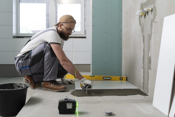tiler-working-renovation-apartment